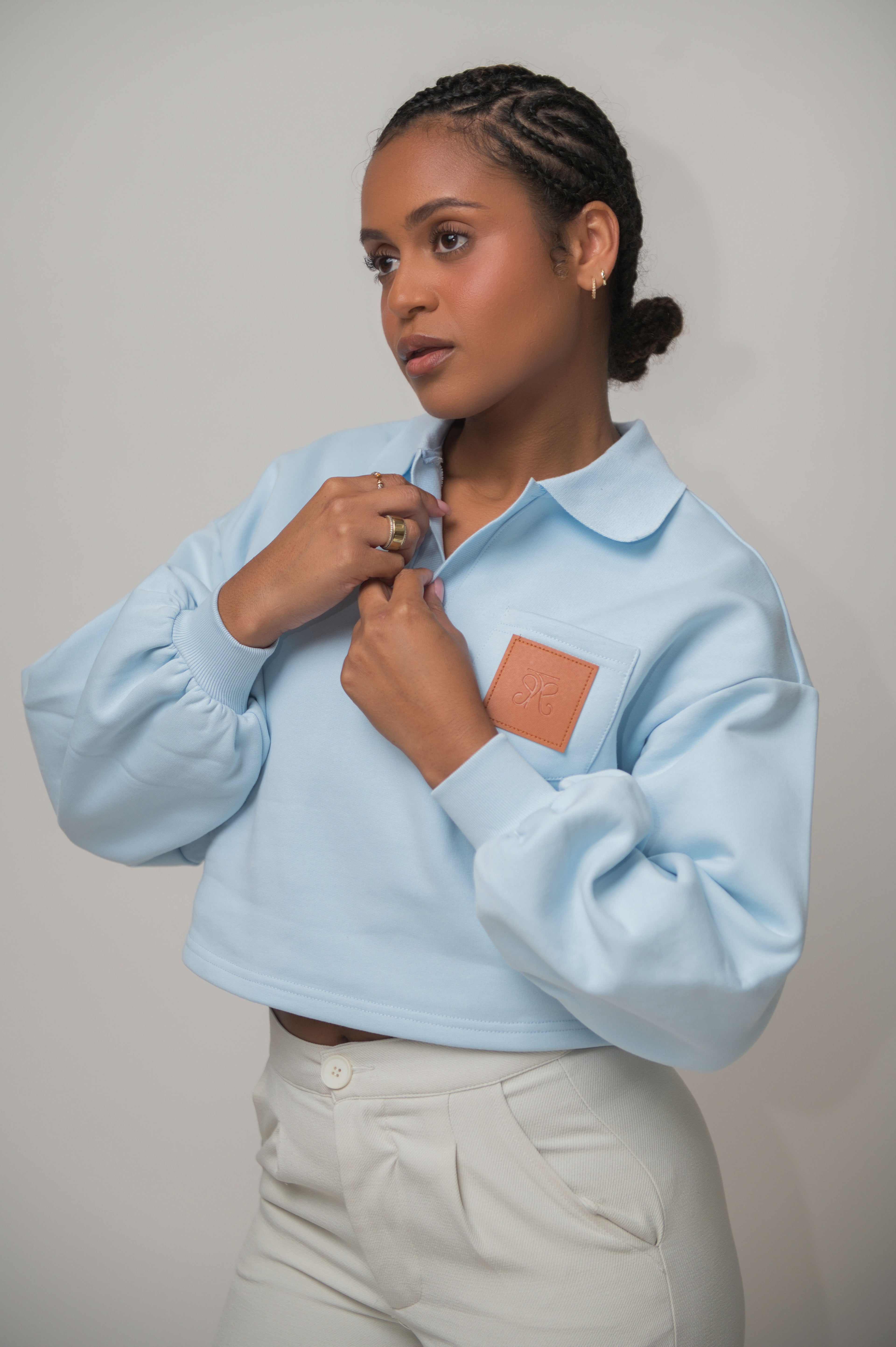 Baby Blue Cropped Sweatshirt with Leather Patch