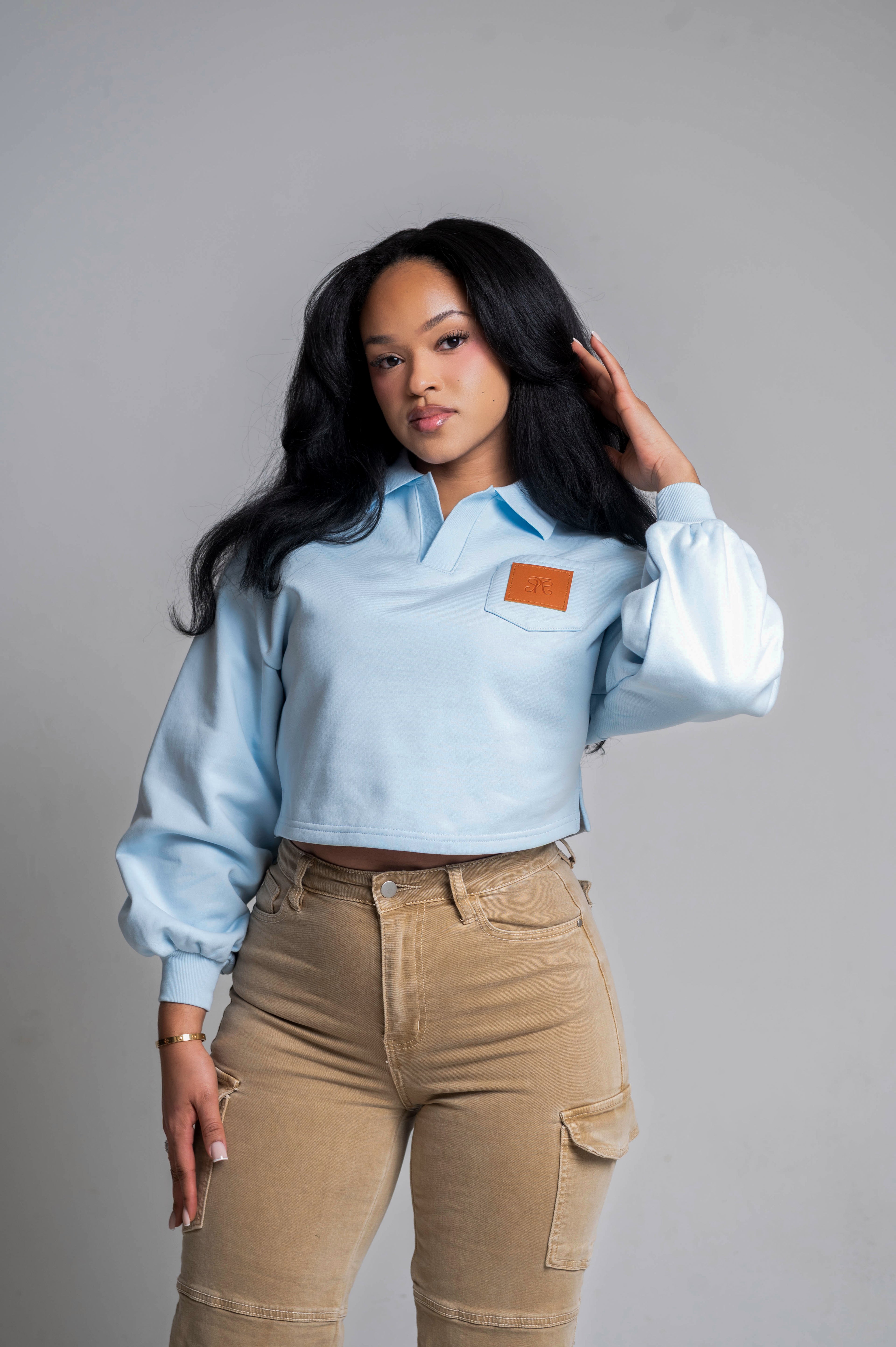 Baby Blue Cropped Sweatshirt with Leather Patch