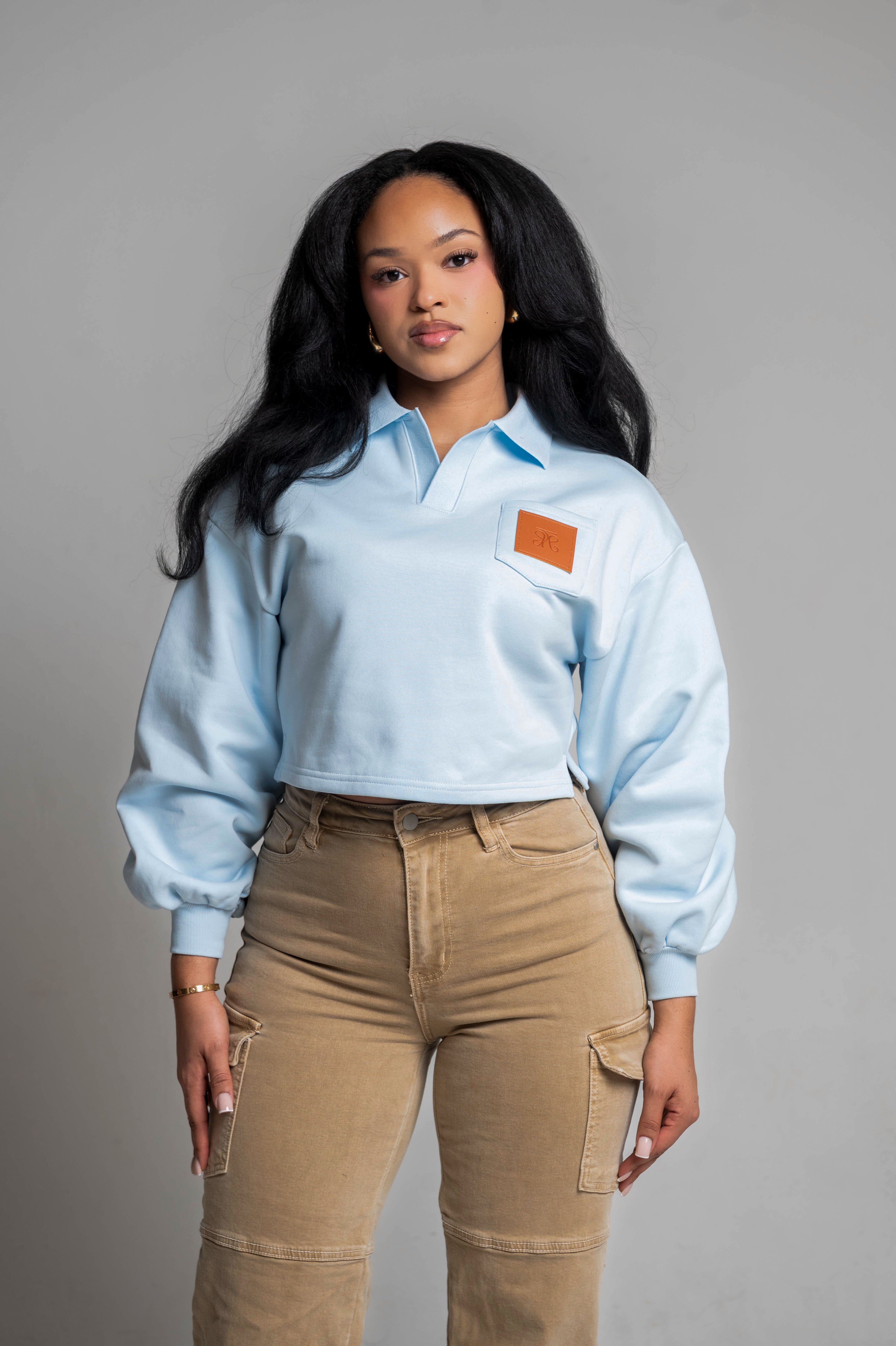 Baby Blue Cropped Sweatshirt with Leather Patch